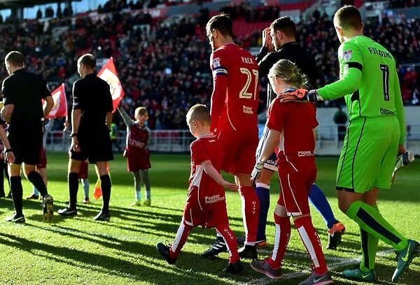 Bristol City Players and Mascots Kick Off Championship Match Against Cardiff City