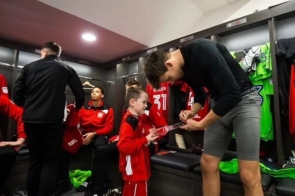 Bristol City Players and Mascots Unite in New Dressing Room before Championship Match
