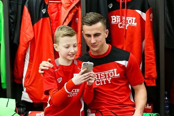 Bristol City Players and Mascots Unite in New Dressing Room before Sky Bet Championship Match