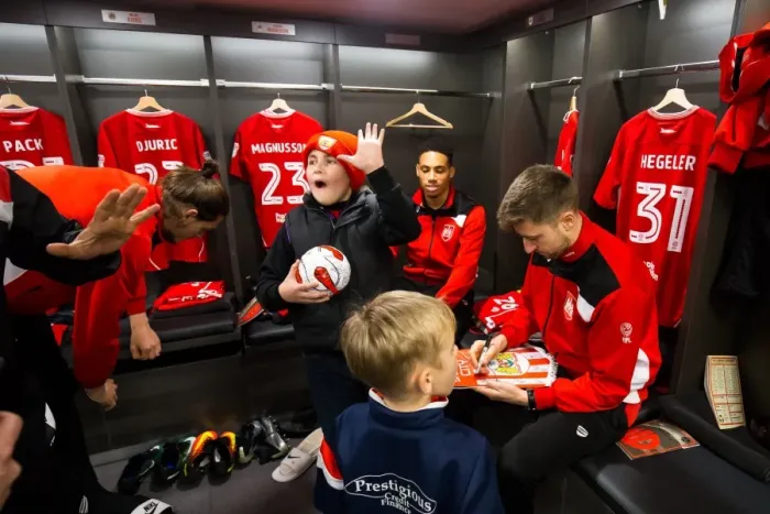 Framed Print : Bristol City Players and Mascots Unite in New Dressing Room Ahead of Sky Bet Championship Clash with Sheffield Wednesday Framed Print : Bristol City Players and Mascots Unite in New Dressing Room Ahead of Sky Bet Championship Clash with Sheffield Wednesday