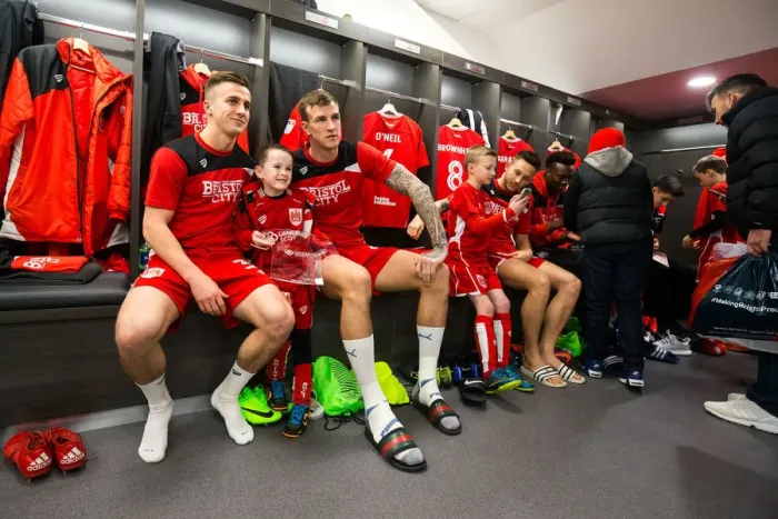 Framed Print : Bristol City Players and Mascots Unite in New Dressing Room Ahead of Sky Bet Championship Match against Sheffield Wednesday