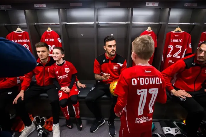 Framed Print : Bristol City Players and Mascots Unite in New Dressing Room Before Championship Match Framed Print : Bristol City Players and Mascots Unite in New Dressing Room Before Championship Match