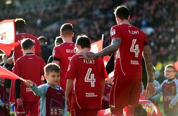 Bristol City Players and Mascots Unite for Sky Bet Championship Match Against Cardiff City