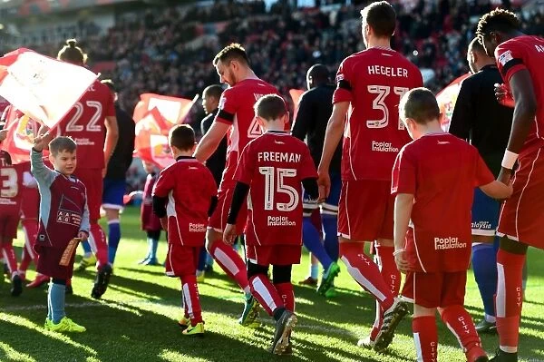 Bristol City Players and Mascots Walk Out at Ashton Gate for Sky Bet Championship Match Against Cardiff City