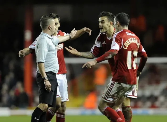 Framed Print : Bristol City Players Protest Referee Decisions During Match Against Walsall
