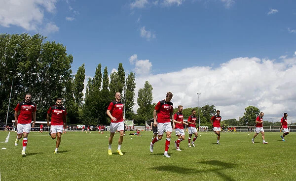 Bristol City Players Warm Up Ahead of Pre-Season Friendly at Brislington Stadium