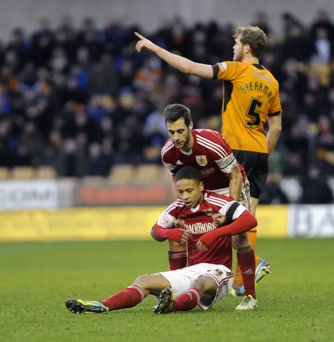 Framed Print : Bristol City: Sam Baldock Consoles Bobby Reid Amidst the Action at Molineux Stadium (Wolverhampton Wanderers vs. Bristol City, Sky Bet League One) Framed Print : Bristol City: Sam Baldock Consoles Bobby Reid Amidst the Action at Molineux Stadium (Wolverhampton Wanderers vs. Bristol City, Sky Bet League One)