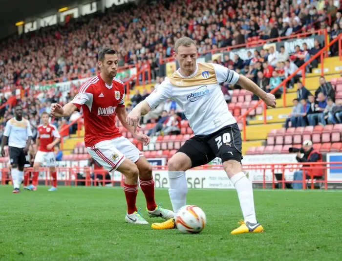 Framed Print : Bristol City Shuts Down Colchester United's Brain Wilson with Sam Baldock