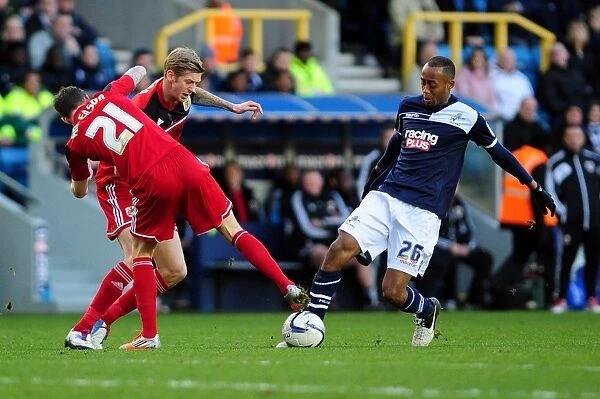 Bristol City Shuts Down Millwall's Nadjim Abdou with Paul Anderson and Jon Stead