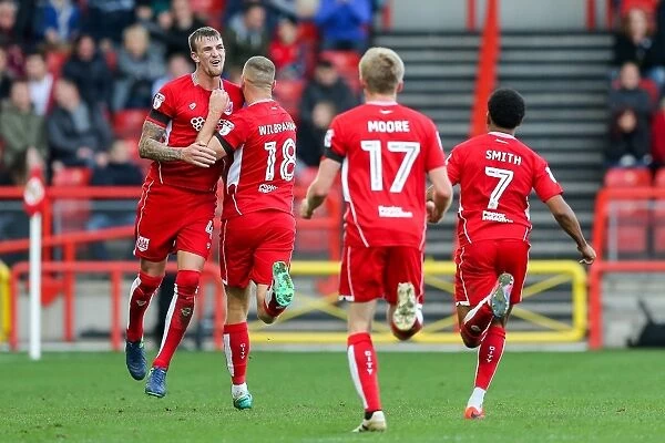 Bristol City Takes Early Lead: Aden Flint and Aaron Wilbraham Celebrate Goal vs. Blackburn Rovers