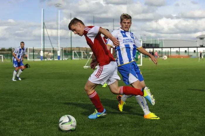 Framed Print : Bristol City U18 vs Brighton U18: Clash between Bevan and Collar at SGS Wise Campus
