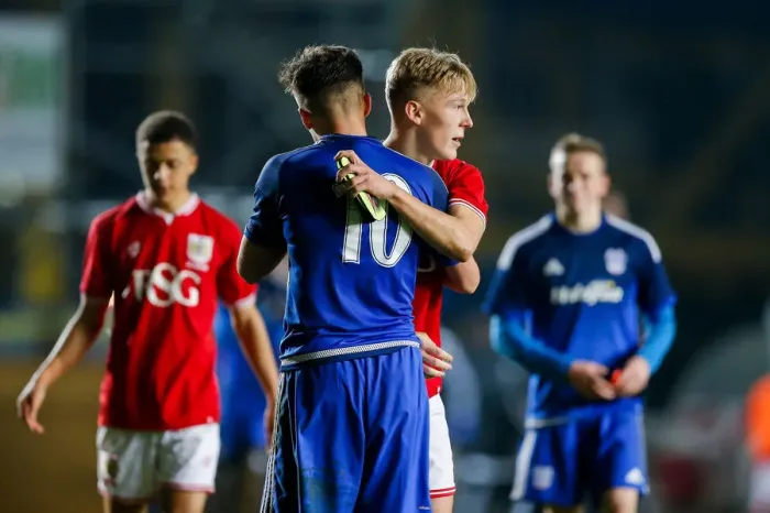 Framed Print : Bristol City U18s Eliminated from FA Youth Cup by Cardiff City U18s: Jake Andrews Consoles Jamie Bird after 0-4 Defeat