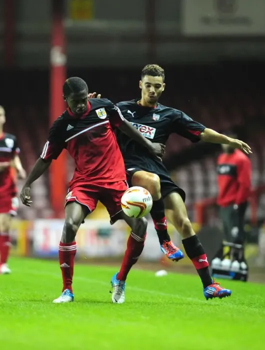 Framed Print : Bristol City U21s: Kevin Karns Fights for Possession against Brentford U21s Framed Print : Bristol City U21s: Kevin Karns Fights for Possession against Brentford U21s