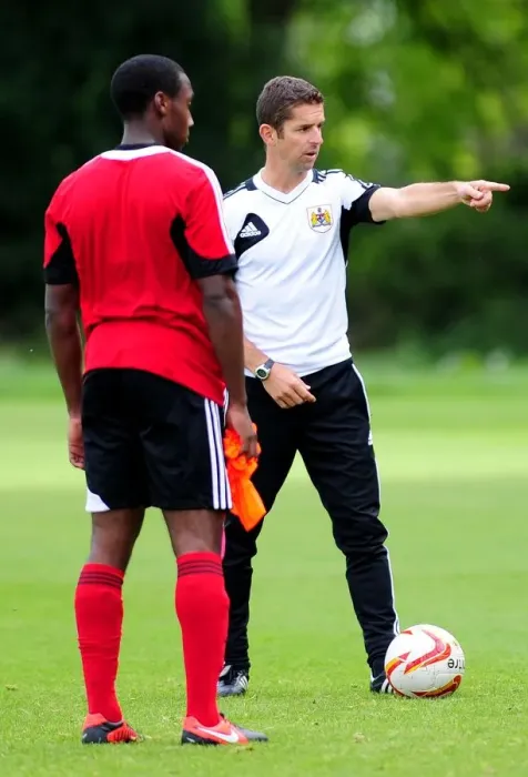 Framed Print : Bristol City Under-21s Coach Alex Russell Leading Training Session at Failand Ground (September 2012)