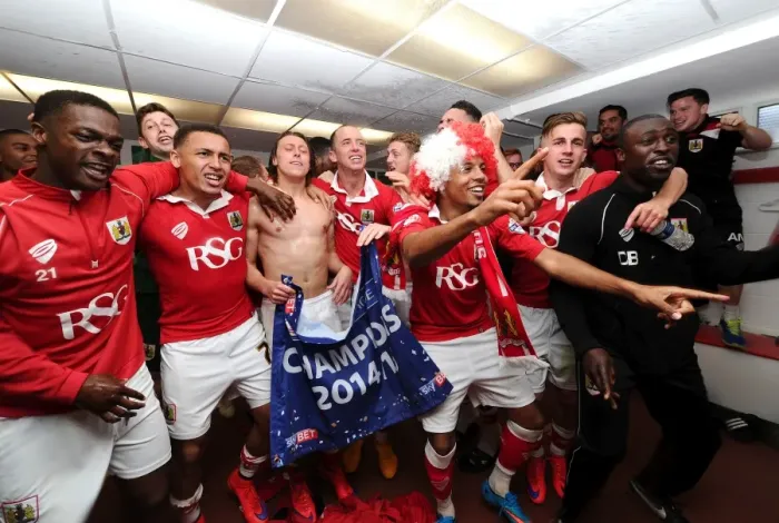 Framed Print : Bristol City: Unforgettable Moment of Triumph - League One Champions in the Changing Room Framed Print : Bristol City: Unforgettable Moment of Triumph - League One Champions in the Changing Room