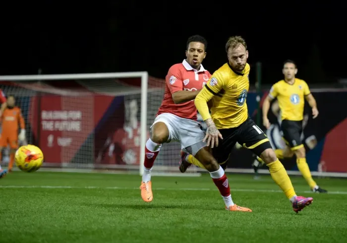 Framed Print : Bristol City vs AFC Wimbledon: A Battle for Ball Supremacy - Korey Smith vs Sean Rigg Framed Print : Bristol City vs AFC Wimbledon: A Battle for Ball Supremacy - Korey Smith vs Sean Rigg