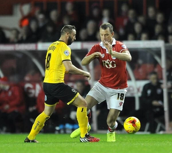 Bristol City vs AFC Wimbledon: Intense Moment as Wilbraham Clashes with Moore