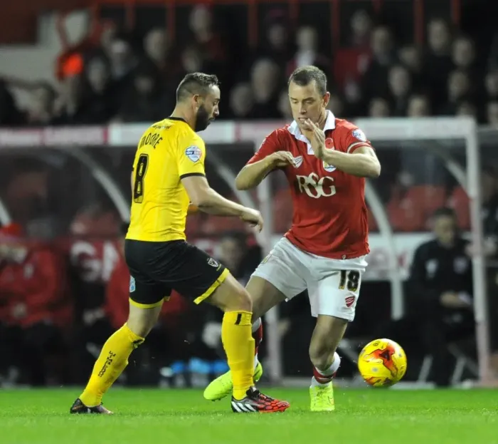 Framed Print : Bristol City vs AFC Wimbledon: Intense Moment as Wilbraham Clashes with Moore Framed Print : Bristol City vs AFC Wimbledon: Intense Moment as Wilbraham Clashes with Moore