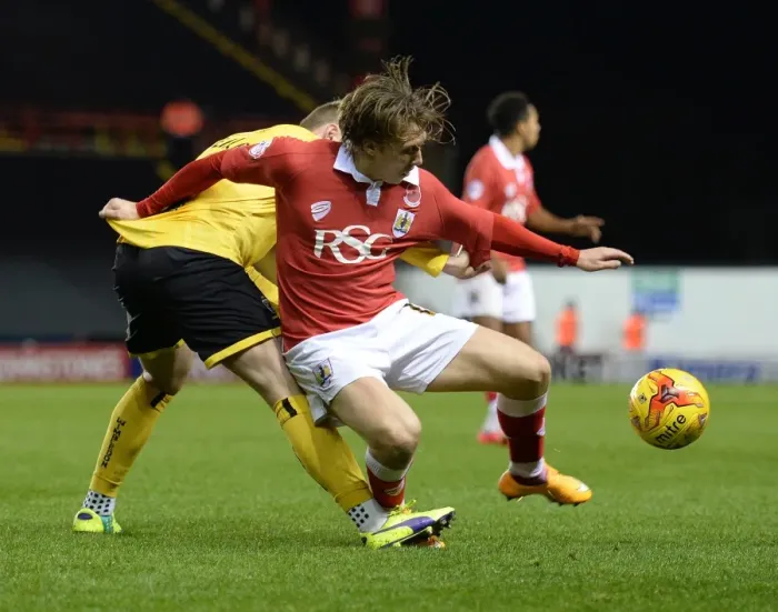Framed Print : Bristol City vs AFC Wimbledon: Tom Beere Fouls Luke Freeman in Johnstone's Paint Trophy Clash