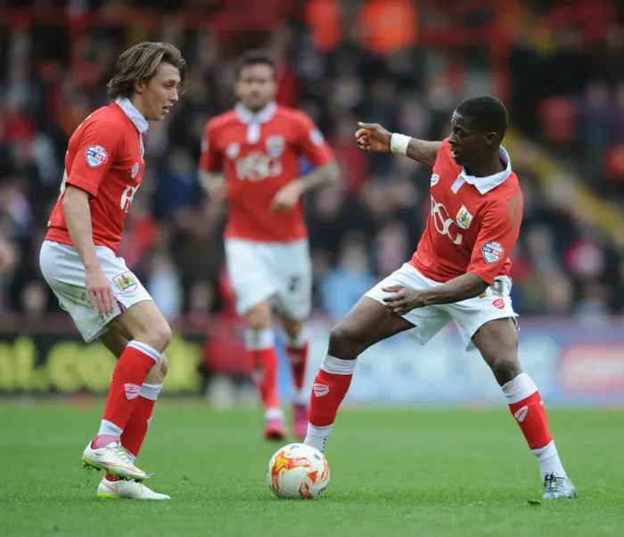 Framed Print : Bristol City vs Barnsley: Agard Outmuscles Freeman in Sky Bet League One Clash Framed Print : Bristol City vs Barnsley: Agard Outmuscles Freeman in Sky Bet League One Clash
