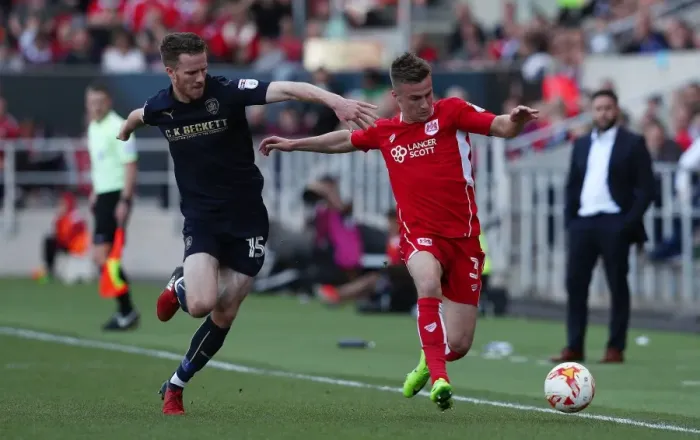 Framed Print : Bristol City vs Barnsley: Clash Between Joe Bryan and Marley Watkins