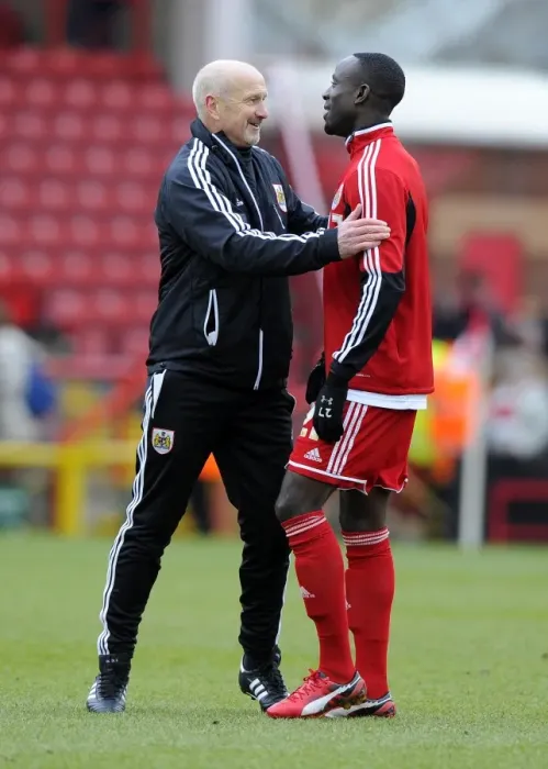 Framed Print : Bristol City vs Barnsley: David Flitcroft and Albert Adomah Face Off in Npower Championship Clash Framed Print : Bristol City vs Barnsley: David Flitcroft and Albert Adomah Face Off in Npower Championship Clash
