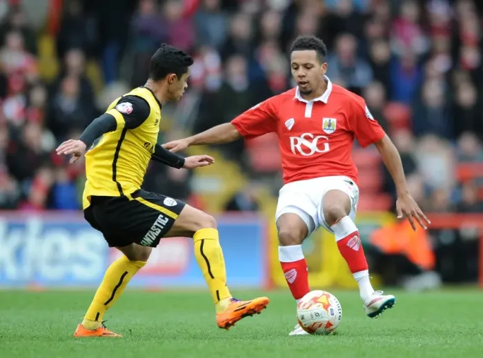 Framed Print : Bristol City vs Barnsley: Intense Moment as Cameron Stewart Closes In on Korey Smith Framed Print : Bristol City vs Barnsley: Intense Moment as Cameron Stewart Closes In on Korey Smith