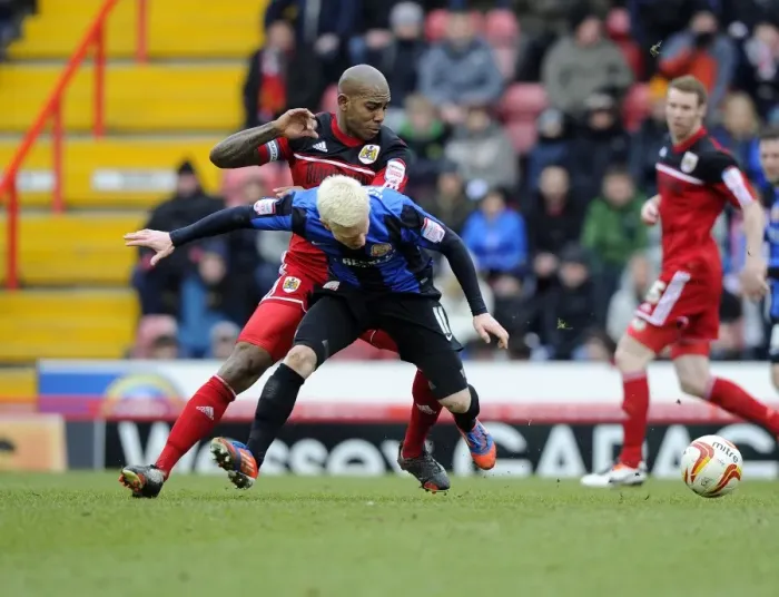 Framed Print : Bristol City vs Barnsley: Marvin Elliott vs David Perkins Battle for Ball in Npower Championship Match Framed Print : Bristol City vs Barnsley: Marvin Elliott vs David Perkins Battle for Ball in Npower Championship Match