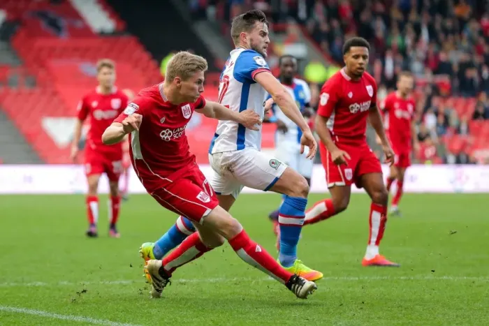 Framed Print : Bristol City vs Blackburn Rovers: Taylor Moore vs Craig Conway Clash in Championship Match Framed Print : Bristol City vs Blackburn Rovers: Taylor Moore vs Craig Conway Clash in Championship Match