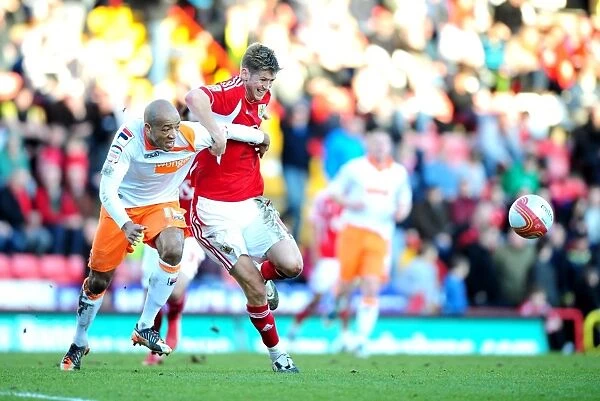 Bristol City vs Blackpool: A Battle for Possession - Jon Stead vs Alex Baptiste, Ashton Gate Stadium, 2012