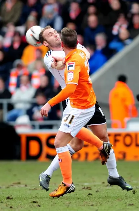 Framed Print : Bristol City vs Blackpool: Intense Aerial Battle Between Liam Kelly and Angel Framed Print : Bristol City vs Blackpool: Intense Aerial Battle Between Liam Kelly and Angel