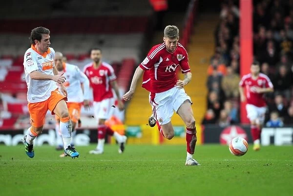 Bristol City vs Blackpool: Jon Stead Chases Down Danny Wilson