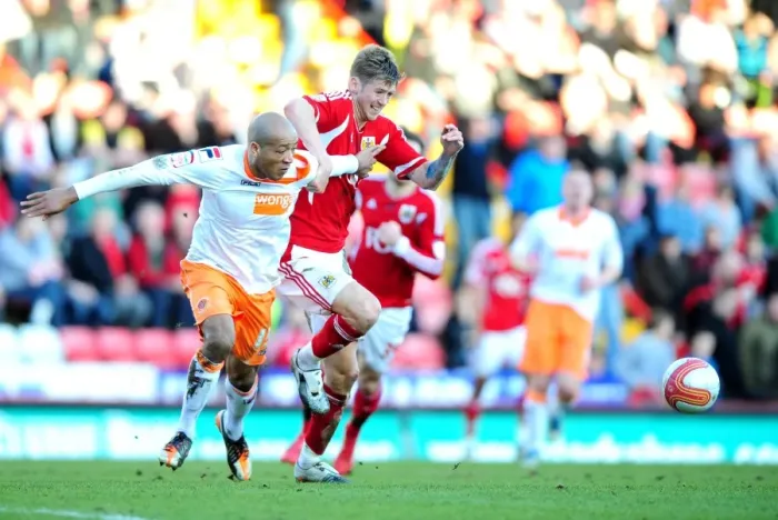 Framed Print : Bristol City vs. Blackpool: Jon Stead vs. Alex Baptiste Battle for Possession at Ashton Gate Stadium