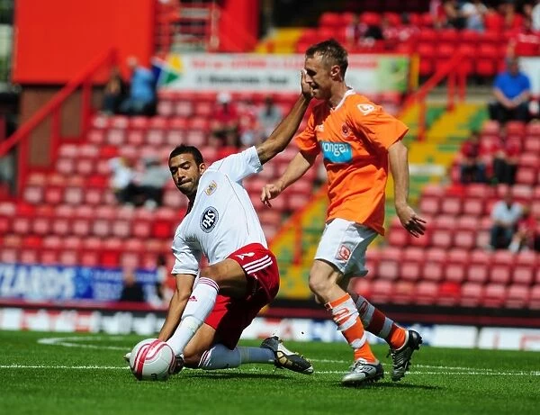 Bristol City vs Blackpool: Liam Fontaine's Battle for the Ball - Championship Football Match, July 2010