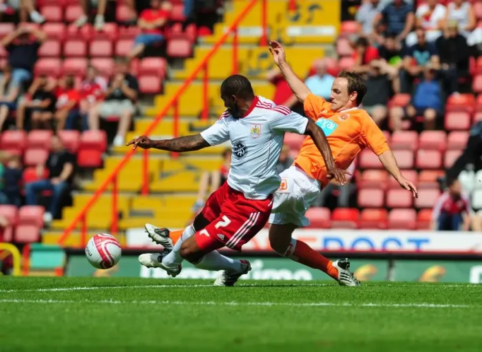 Framed Print : Bristol City vs Blackpool: Marvin Elliott's Battle for the Ball - Championship Football Match, 2010 Framed Print : Bristol City vs Blackpool: Marvin Elliott's Battle for the Ball - Championship Football Match, 2010