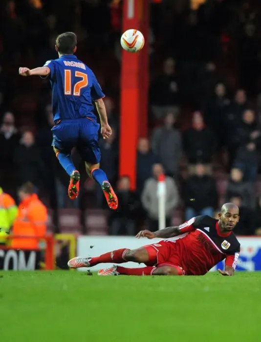 Framed Print : Bristol City vs Blackpool: Sam Baldock Tackles Chris Basham in Championship Clash