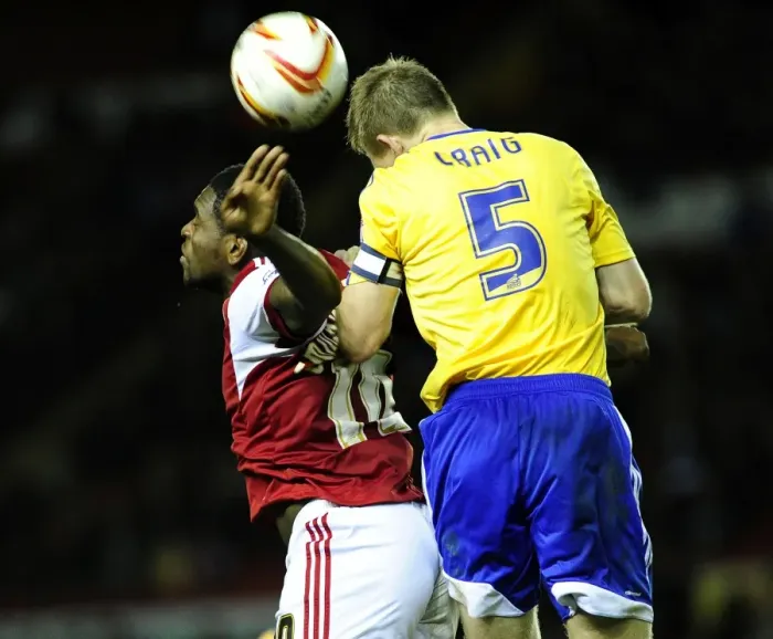 Framed Print : Bristol City vs Brentford: Intense Moment Between Jay Emmanuel-Thomas and Tony Craig