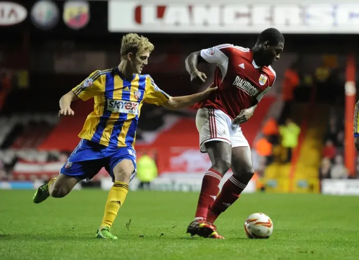 Framed Print : Bristol City vs Brentford: Jay Emmanuel-Thomas Evades George Saville