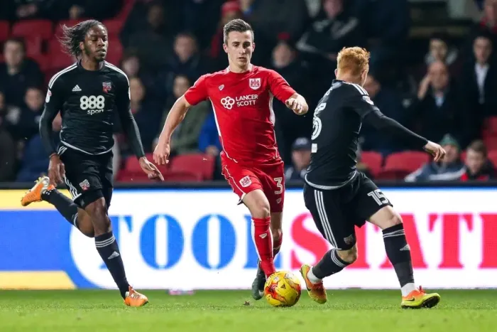 Framed Print : Bristol City vs Brentford: Joe Bryan Faces Off Against Ryan Woods Framed Print : Bristol City vs Brentford: Joe Bryan Faces Off Against Ryan Woods