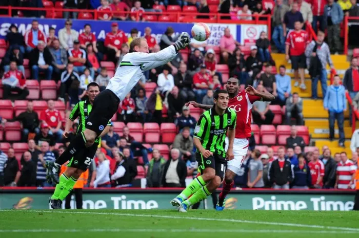 Framed Print : Bristol City vs. Brighton: Ankergren Clears the Ball in Championship Clash at Ashton Gate, September 10, 2011