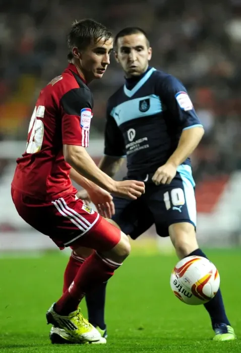 Framed Print : Bristol City vs Burnley: A Championship Showdown at Ashton Gate Stadium - Joe Bryan vs Martin Paterson Framed Print : Bristol City vs Burnley: A Championship Showdown at Ashton Gate Stadium - Joe Bryan vs Martin Paterson