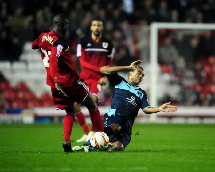 Framed Print : Bristol City vs Burnley: Clash between Stanislas and Adomah
