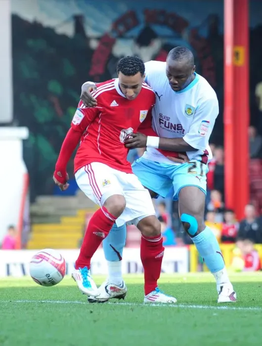 Framed Print : Bristol City vs Burnley: Intense Battle Between Nicky Maynard and Andre Bikey in the 2011 Championship Match Framed Print : Bristol City vs Burnley: Intense Battle Between Nicky Maynard and Andre Bikey in the 2011 Championship Match