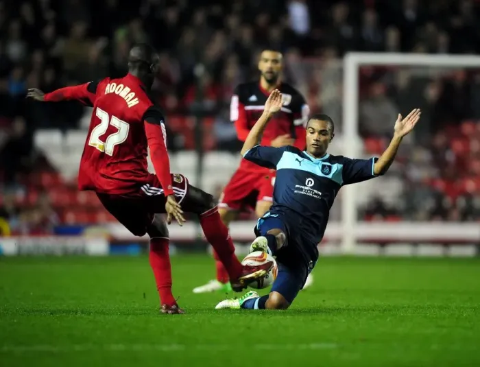 Framed Print : Bristol City vs Burnley: Intense Moment as Junior Stanislas Tackles Albert Adomah Framed Print : Bristol City vs Burnley: Intense Moment as Junior Stanislas Tackles Albert Adomah