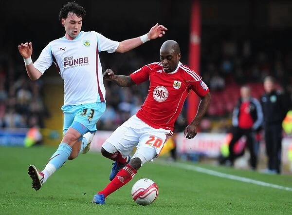 Bristol City vs. Burnley: Jamal Campbell-Ryce vs. Chris Eagles Battle for the Ball - Championship Match, 2011
