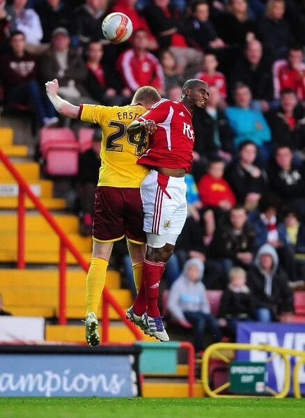 Bristol City vs Burnley: Marvin Elliott vs Brian Easton Battle for the High Ball - Championship Match, 05 / 11 / 2011