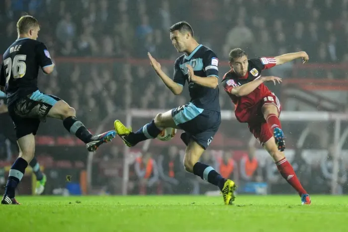 Framed Print : Bristol City vs Burnley: Steven Davies Shot Blocked by Jason Shackell