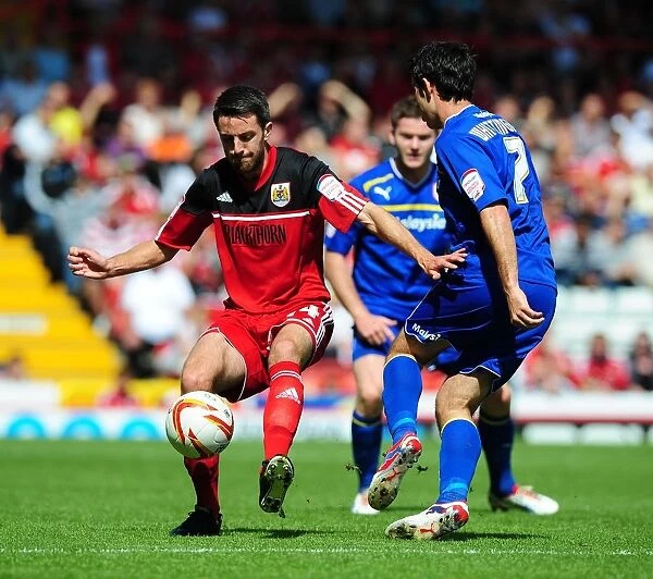 Bristol City vs. Cardiff City: Cole Skuse vs. Peter Wittingham - Football Rivalry on the Pitch
