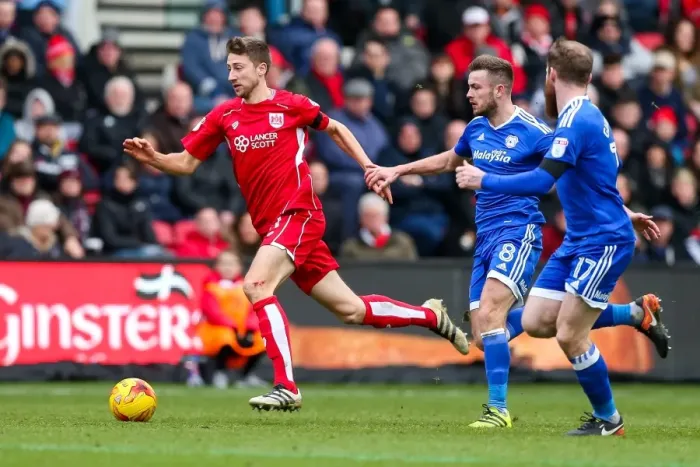 Framed Print : Bristol City vs. Cardiff City: Intense Clash Between Jens Hegeler and Joe Ralls
