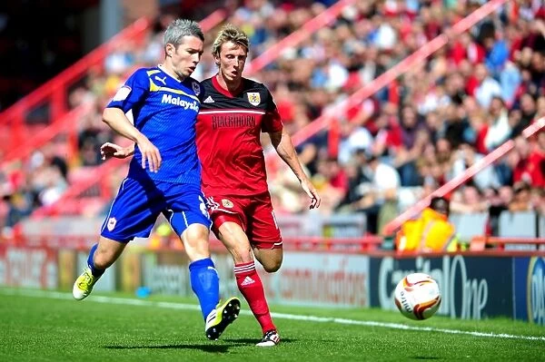 Bristol City vs. Cardiff City: Intense Moment between Woolford and McNaughton in Championship Clash
